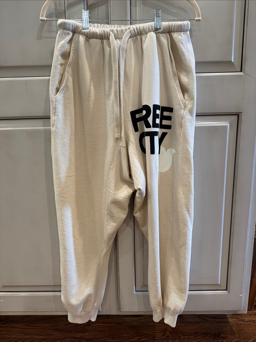 NWOT freecity Large Pocket Drop Crotch Cream Graphic Joggers with Black Logo